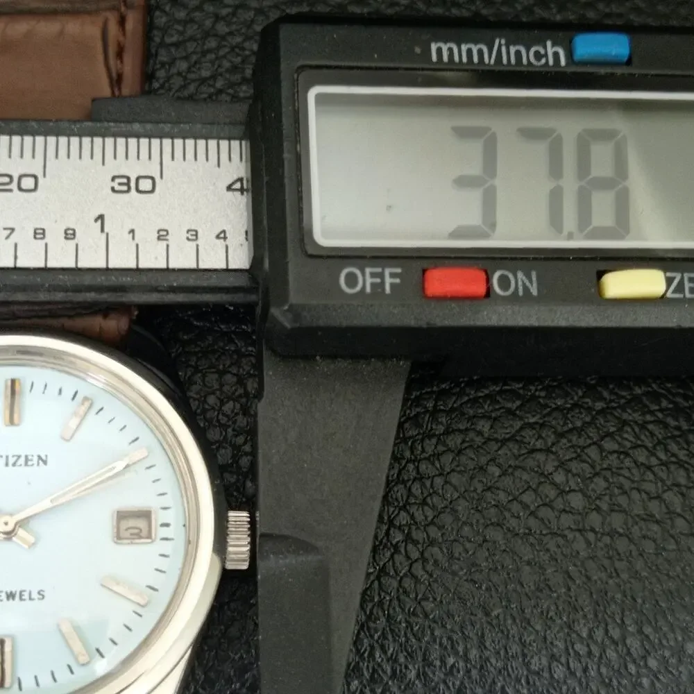 Vintage 1989 Citizen Manual Mens Silver Watch W/daydate & Blue accents
